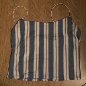 Blue, white, and yellow/brown striped shirt